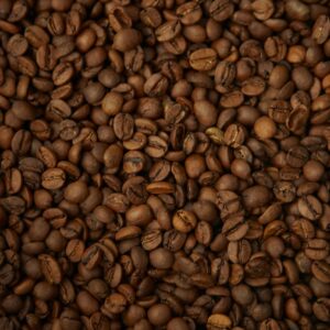 A detailed view of freshly roasted coffee beans showcasing texture and color.